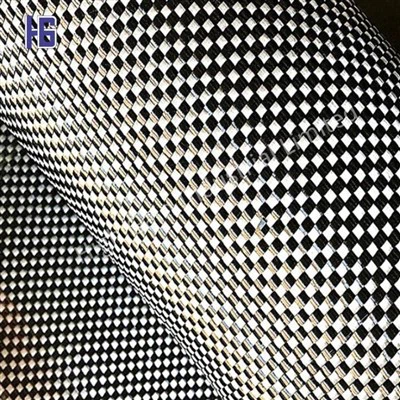 Tejido híbrido compuesto